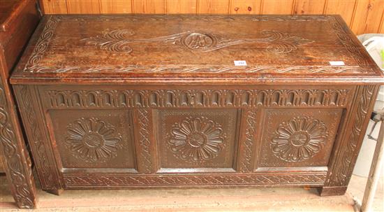 18th century panelled oak coffer, later carved(-)